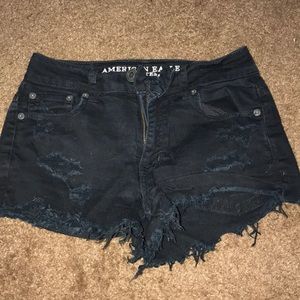 Black distressed shorts